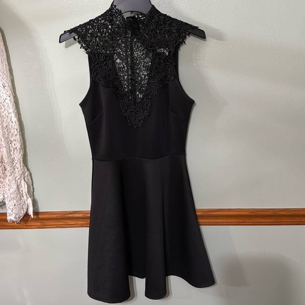 Charlotte Russe vintage short dress. Black with high neck lace and bow back. Med